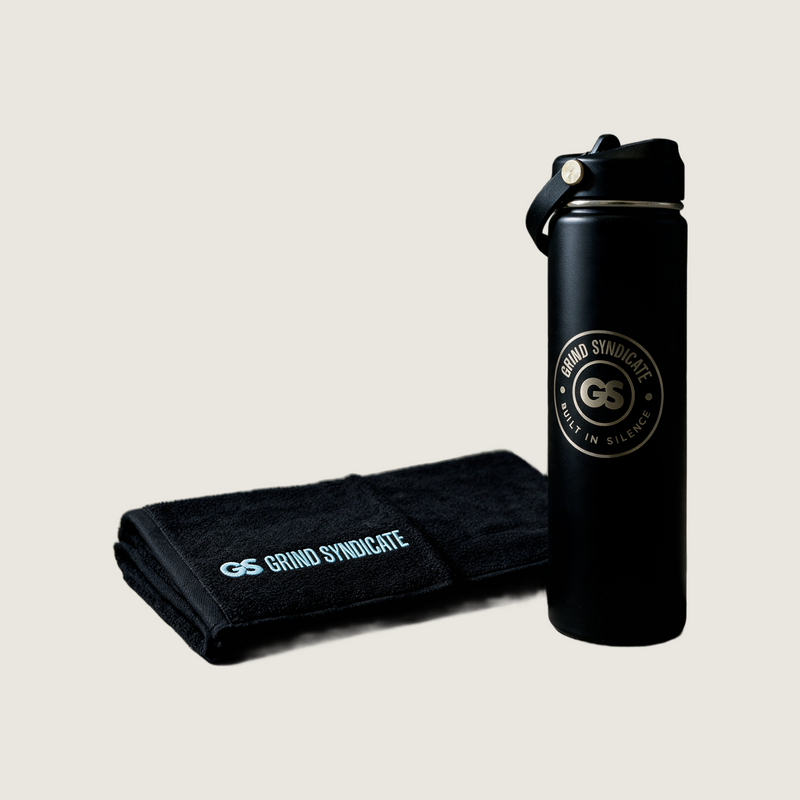 Grind Syndicate session shift towel bottle in Iced Blue on a plain bone background