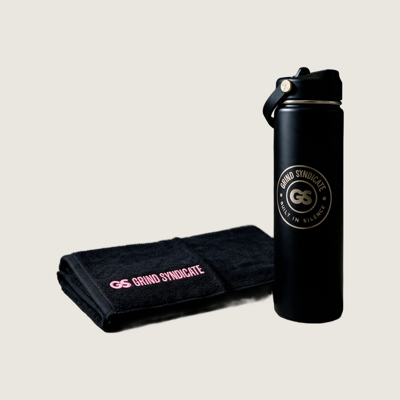 Grind Syndicate session shift towel bottle in Urban Pink on a plain bone background